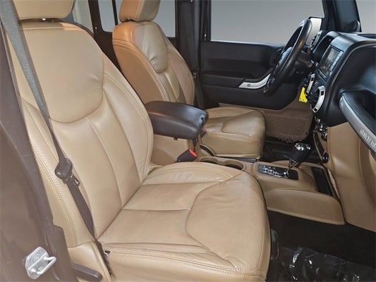 2014 Jeep Wrangler Unlimited Sahara in Grand Haven, MI - Preferred Auto Dealerships